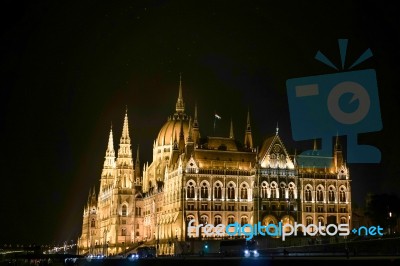 Hungarian Parliament Building Illumintaed At Night In Budapest Stock Photo