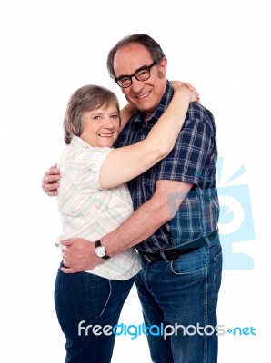 Husband And Wife Hugging Each Other Stock Photo