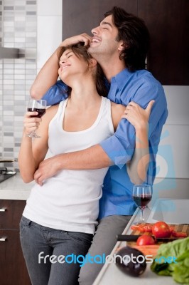 Husband Embrassing His Wife From Behind Stock Photo