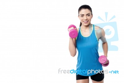 I Am Workout With Dumbbells Regularly Stock Photo