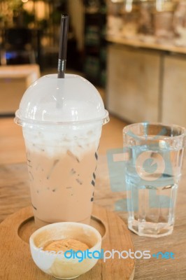 Ice Caffe Mocha Serving On Wooden Table Stock Photo