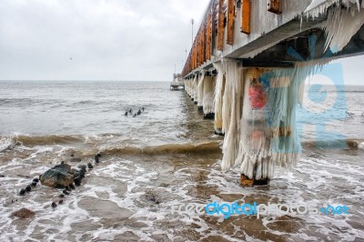 Ice Covered Pier Stock Photo