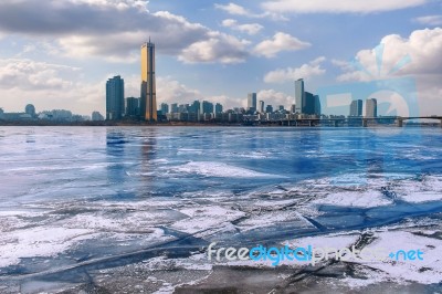 Ice Of Han River And Cityscape In Winter,sunset In Seoul, South Korea Stock Photo