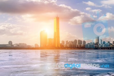 Ice Of Han River And Cityscape In Winter,sunset In Seoul, South Korea Stock Photo