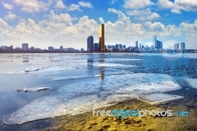 Ice Of Han River And Cityscape In Winter,sunset In Seoul, South Korea Stock Photo