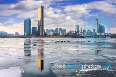 Ice Of Han River And Cityscape In Winter,sunset In Seoul, South Korea Stock Photo