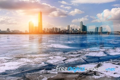 Ice Of Han River And Cityscape In Winter,sunset In Seoul, South Korea Stock Photo