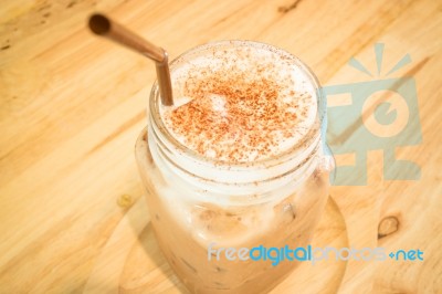 Iced Cofee Mocha Drink Serving On Wooden Table Stock Photo