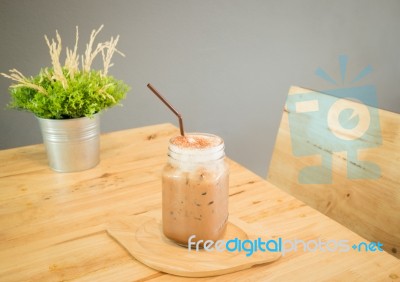 Iced Cofee Mocha Drink Serving On Wooden Table Stock Photo