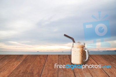 Iced Coffee Cup With Blue Sea View Stock Photo