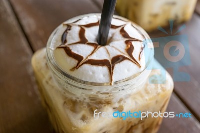 Iced Coffee Mocha On Table Wood Background In Cafe Stock Photo