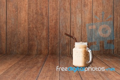 Iced Coffee On Old Wooden Interior Texture Background Stock Photo