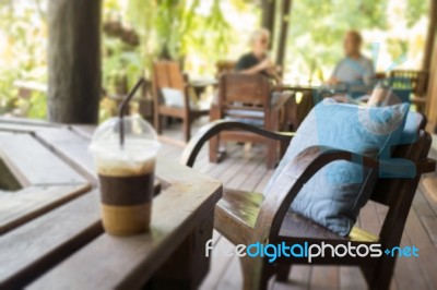 Iced Coffee With Milk Foam Stock Photo