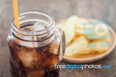 Iced Cola With Potato Chips Stock Photo