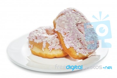 Iced Donuts in plate Stock Photo