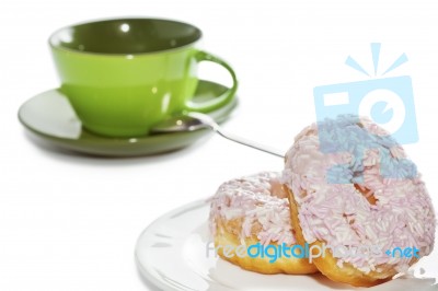 Iced Doughnuts With Coffee Cup Stock Photo