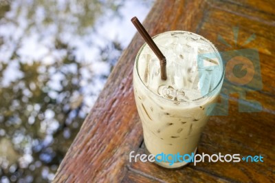 Iced Latte Coffee On Table Close Up Stock Photo