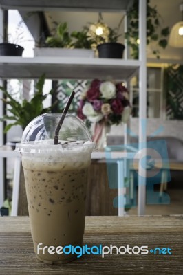 Iced Mocha Coffee On Wooden Table Stock Photo