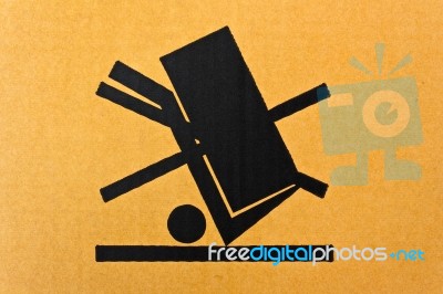 Image Close-up Of Grunge Black Fragile Symbol On Cardboard Stock Photo