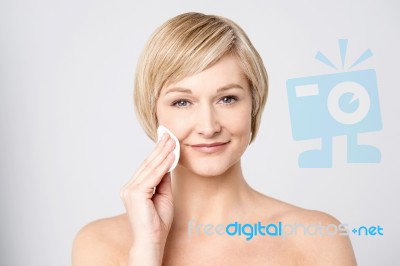 Image Of A Woman Cleaning Her Face Stock Photo