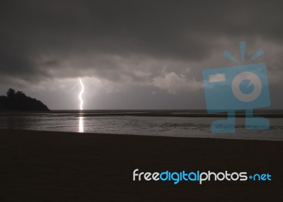 Incredibly Sharp Lightning With Branches Hitting The Ocean With Stock Photo