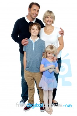 Indoor Studio Shot Of Lovely Family, Four Members Stock Photo