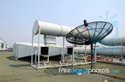 Industrial Air Conditioner And Satellite Dish Stock Photo