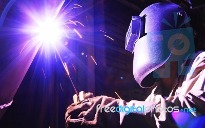 Industrial Worker Make A Spark Welding Stock Photo