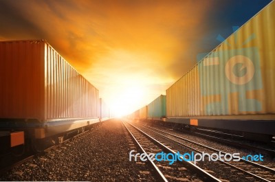 Industry Container Trainst Running On Railways Track Against Bea… Stock Photo