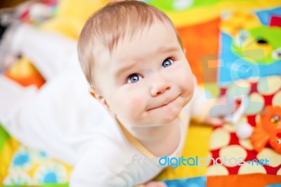 Infant Boy On Playmat Stock Photo