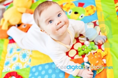 Infant Boy On Playmat Stock Photo