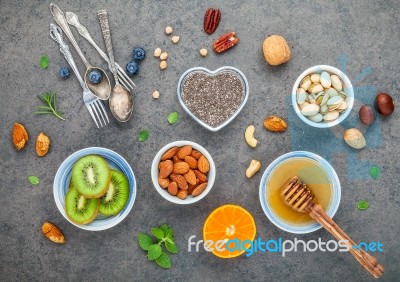 Ingredients For A Healthy Foods Background, Nuts, Honey, Berries… Stock Photo