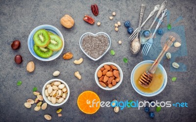 Ingredients For A Healthy Foods Background, Nuts, Honey, Berries… Stock Photo