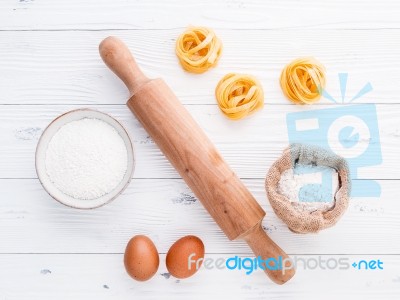 Ingredients For Homemade Pasta  Flour And Eggs On Wooden Backgro… Stock Photo