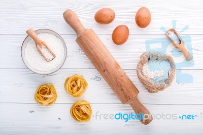 Ingredients For Homemade Pasta  Flour And Eggs On Wooden Backgro… Stock Photo