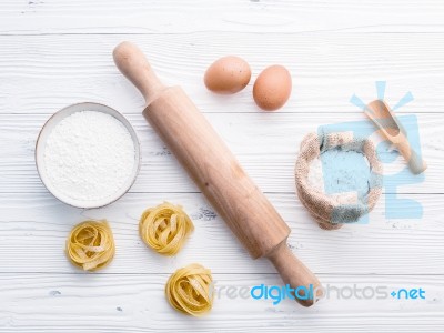 Ingredients For Homemade Pasta  Flour And Eggs On Wooden Backgro… Stock Photo