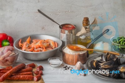 Ingredients For Paella On The White Scratched Table Horizontal Stock Photo