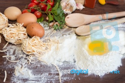 Ingredients Preparation Spaghetti With Eggs, Tomatoes Herbs And Spices Stock Photo