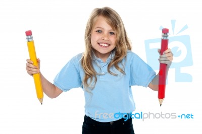 Innocent Child Posing With Colorful Pencils Stock Photo