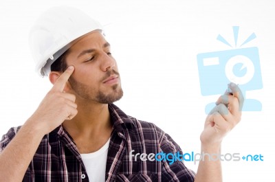 Innovative Male Looking At Electric Bulb Stock Photo