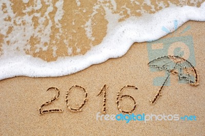 Inscription Of The Year 2016 Written In The Wet Yellow Beach Sa Stock Photo