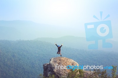 Instagram Filter Young Man Asia Tourist At Mountain Is Watching Over The Misty And Foggy Morning Sunrise, Travel Trekking Stock Photo