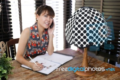 Intentionally Blurred Working Woman Background For Any Commercial Purpose Stock Photo