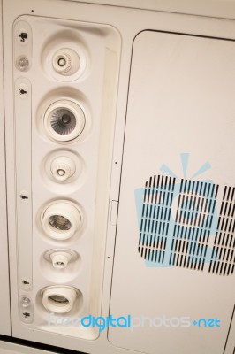 Interior Of Airplane Seat With Ceiling Button Stock Photo