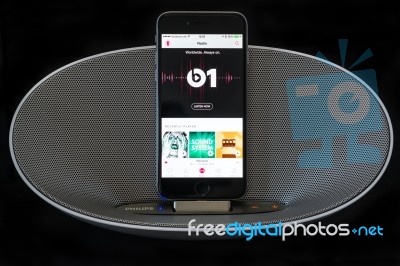 Iphone 6 With Loudspeaker Displaying The Apple Music Radio Screen Stock Photo