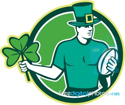 Irish Rugby Player Holding Shamrock Stock Image