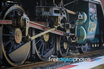 Iron Wheels Of Stream Engine Locomotive Train On Railways Track Perspective To Golden Light Forward Use For Old And Classic Period Land Transport And Retro Vintage Style Background
Image Id:246972886 Stock Photo