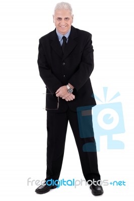 Isolated Handsome Mature Business Man Standing Stock Photo