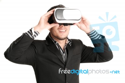 Isolated Young Businessman With Virtual Reality Glasses Stock Photo