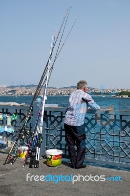 Istanbul, Turkey - May 24 : View Of A Man Fishing In Istanbul Turkey On May 24, 2018. One Unidentified Man Stock Photo